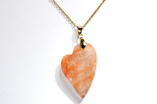 Collier en pierre naturelle de cristal de roche et d'hématite; collier en pierre naturelle de quartz hematoide et acier inoxydable; collier en pierre naturelle et en acier inoxydable; collier en pierre; lithotherapie ; lithothérapie ; bijoux en quartz hématoide ; signature minérale ; signature minerale 